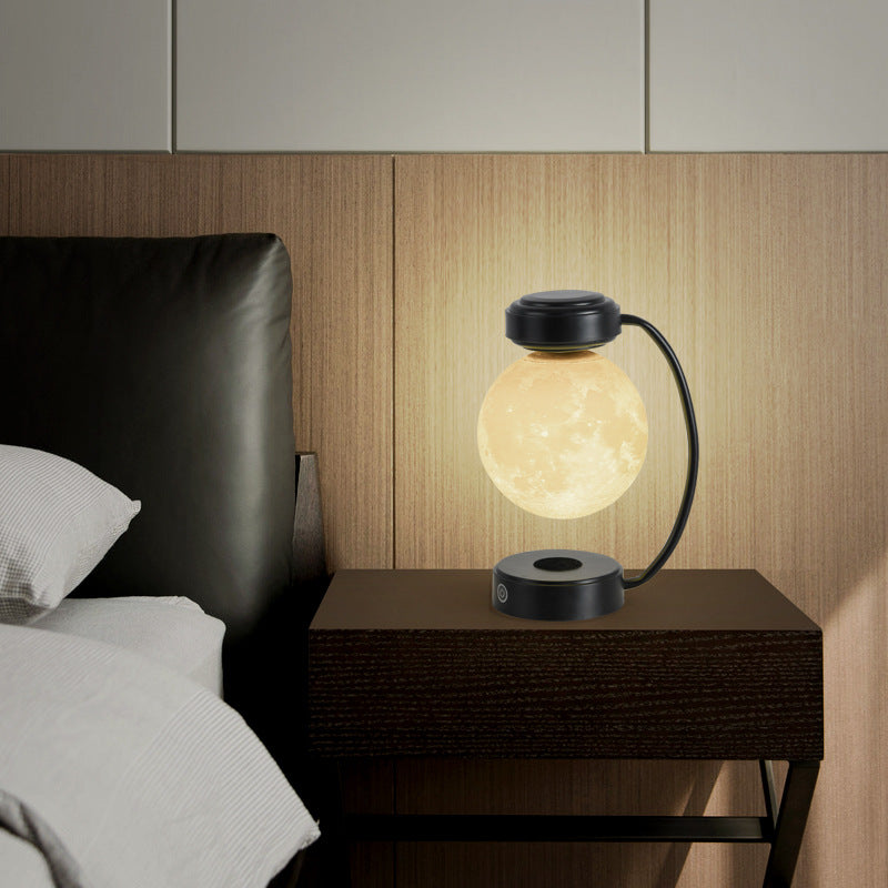 Svävande månlampa med magnetisk levitation och roterande boll