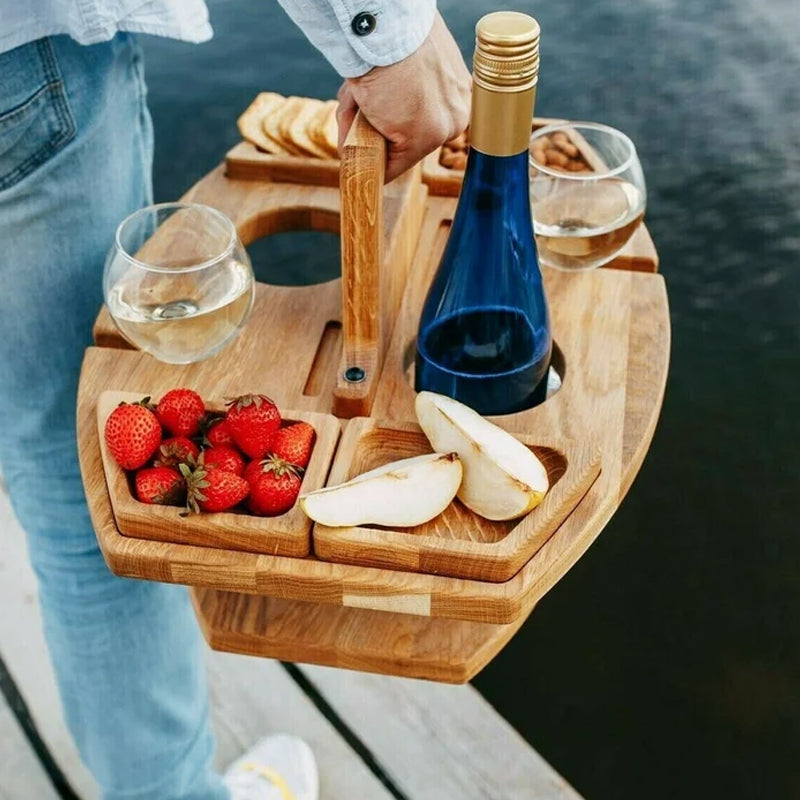 Kompakt picknickbord med flaskhållare i trä