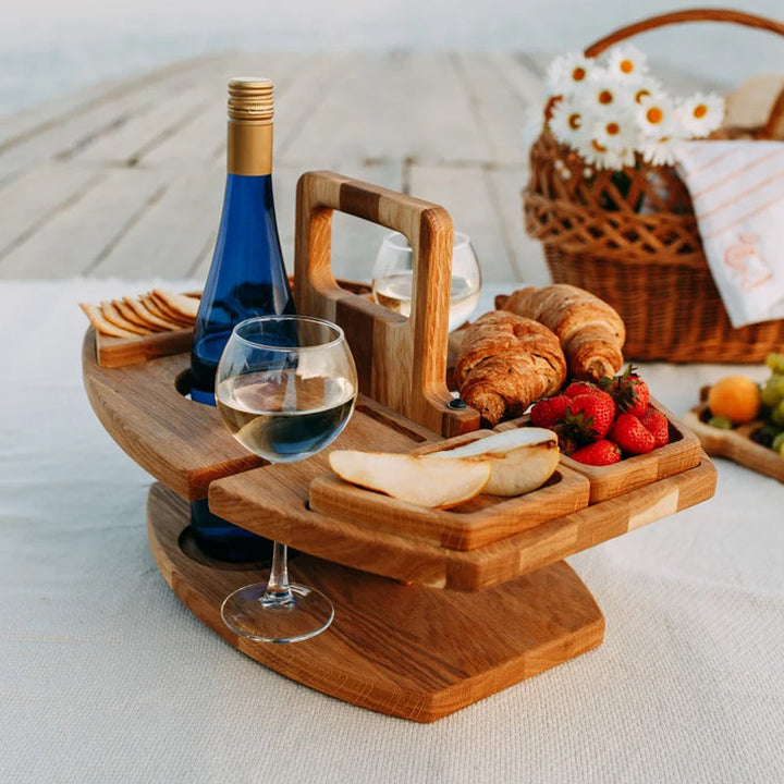 Kompakt picknickbord med flaskhållare i trä