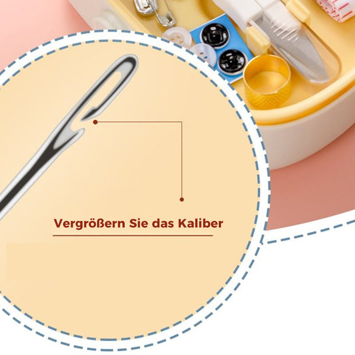Sandsberg-in-One-symaskin med knapp och fingerborg