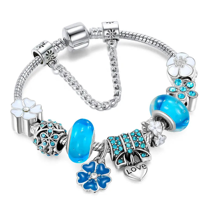 Charmarmband med blommönster – Elegant gåva