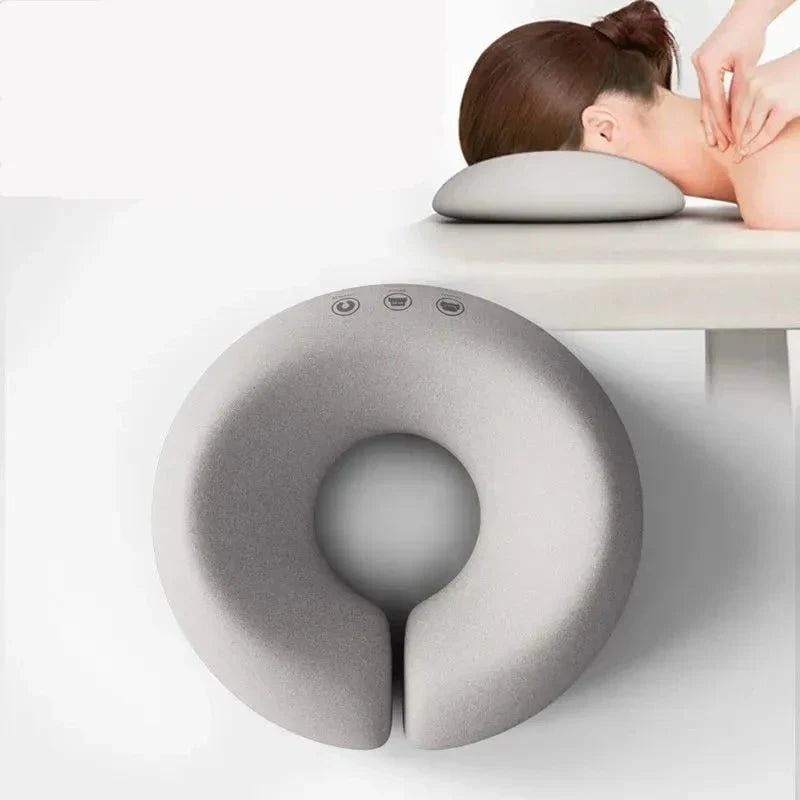 Ergonomiskt nackstöd för massagebänk