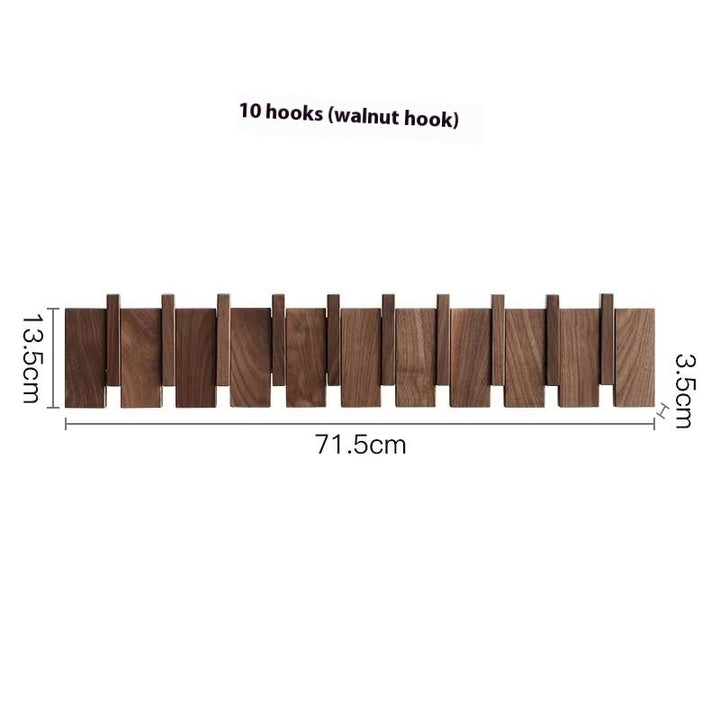 Träklädhängare i piano-design med fällbara krokar | Karnz