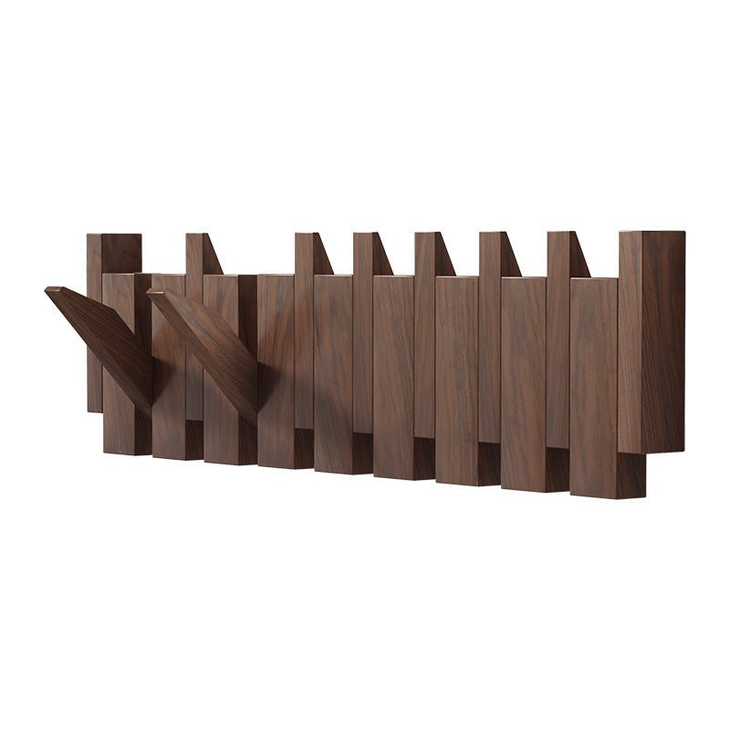 Träklädhängare i piano-design med fällbara krokar | Karnz