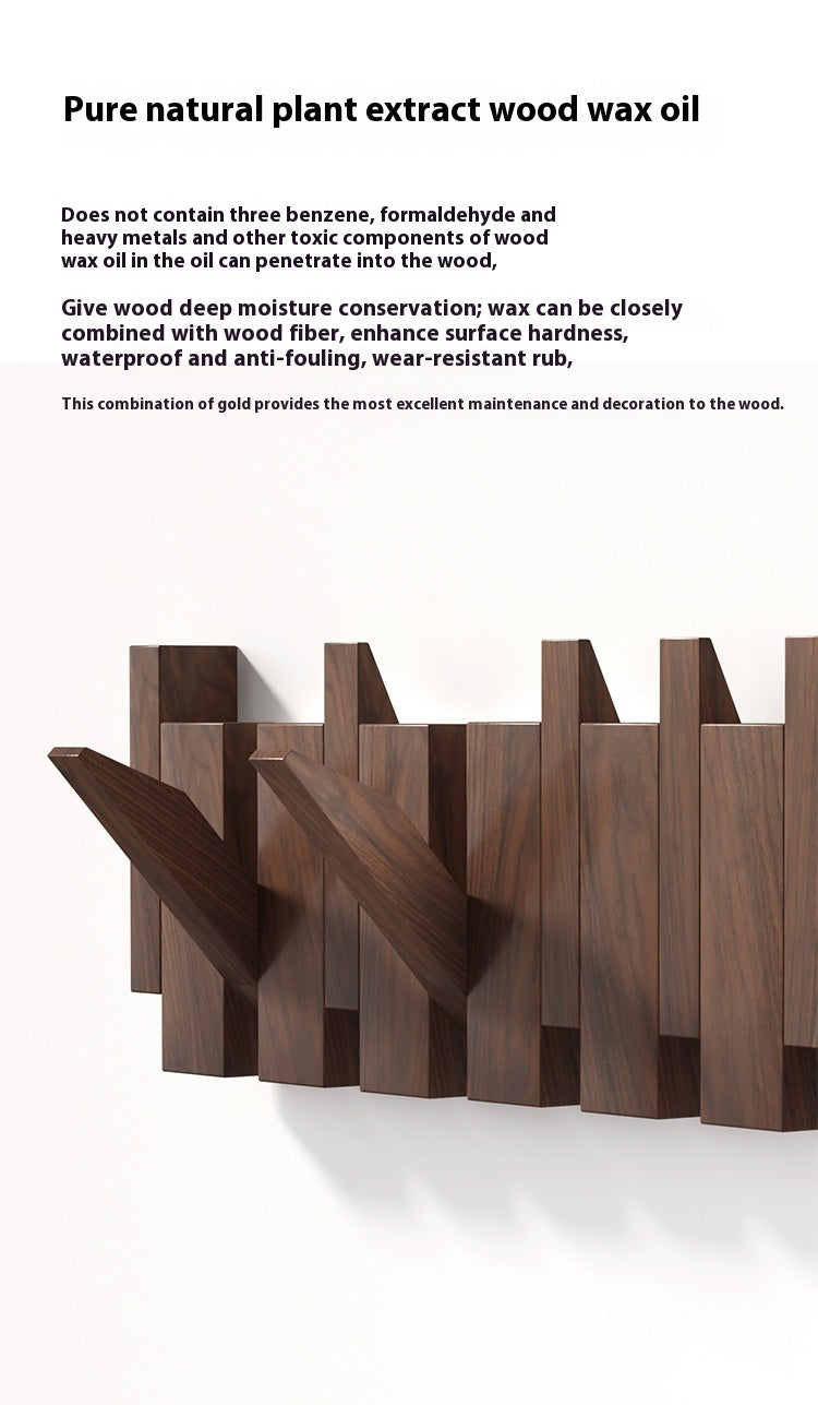 Träklädhängare i piano-design med fällbara krokar | Karnz