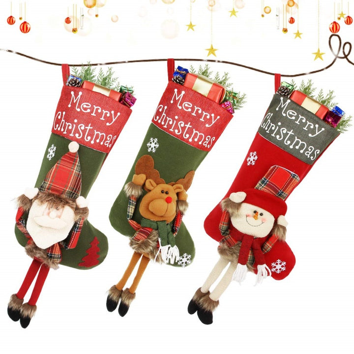 Julstrumpa med tomte och dinglande ben