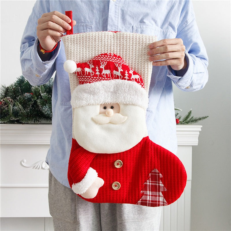 Stickad julstrumpa med tomte