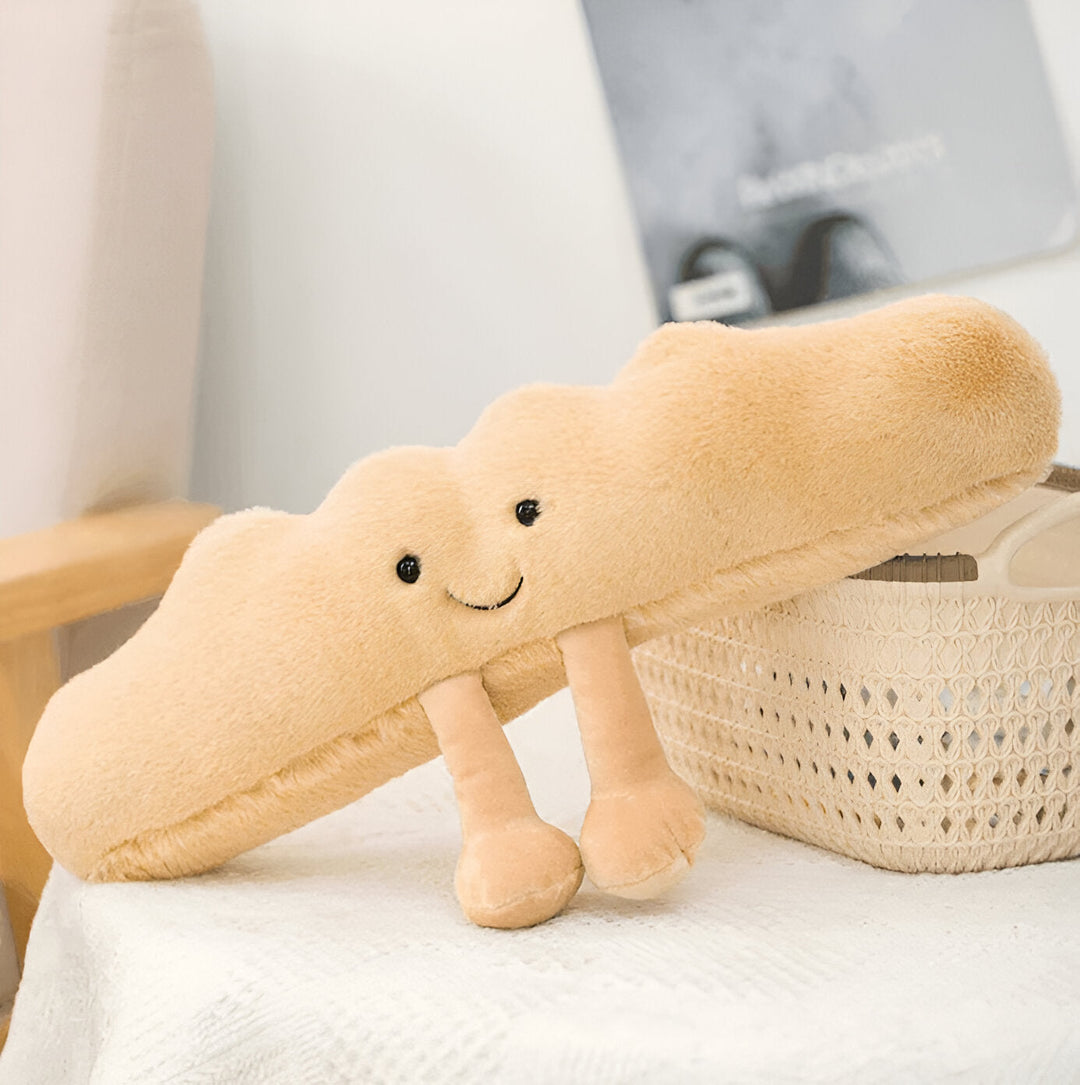 Plushbaguette – Mjuk kuddformad som frukostdesign