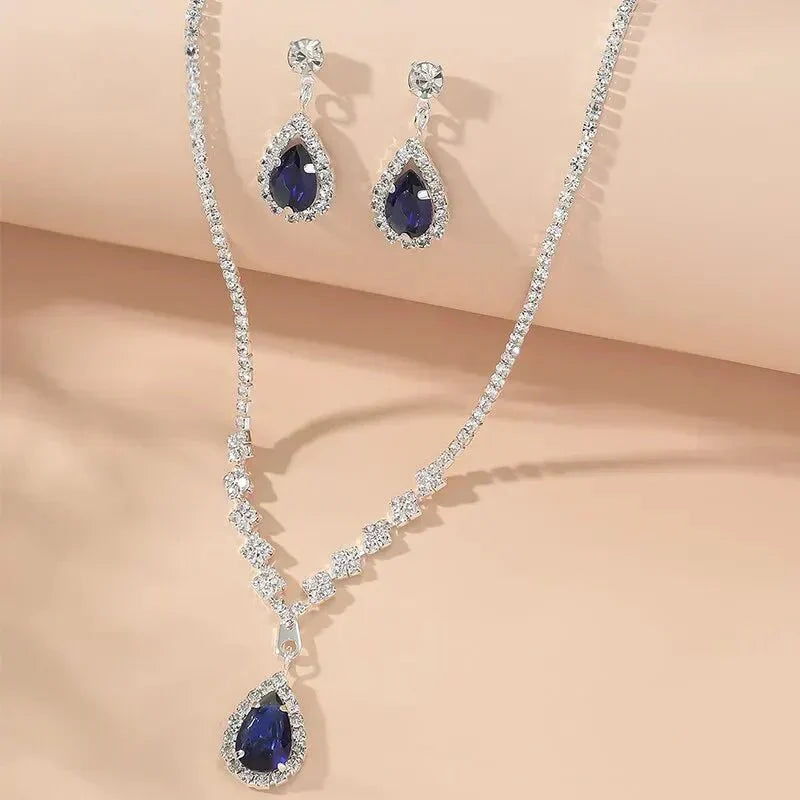 Karnz | Glittrande blå dropp-diamant-halsband och örhänge set
