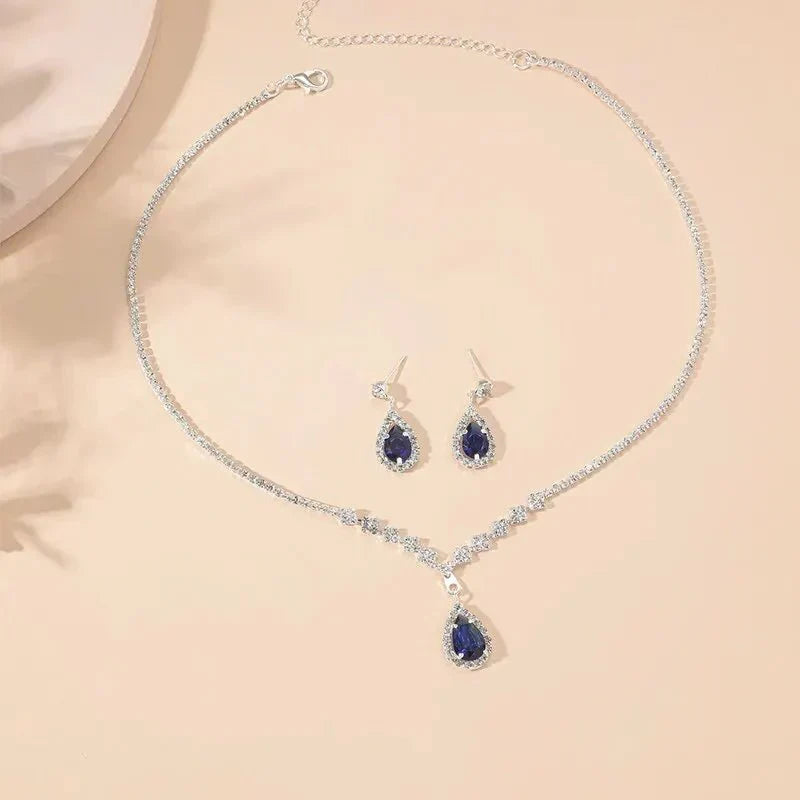 Karnz | Glittrande blå dropp-diamant-halsband och örhänge set