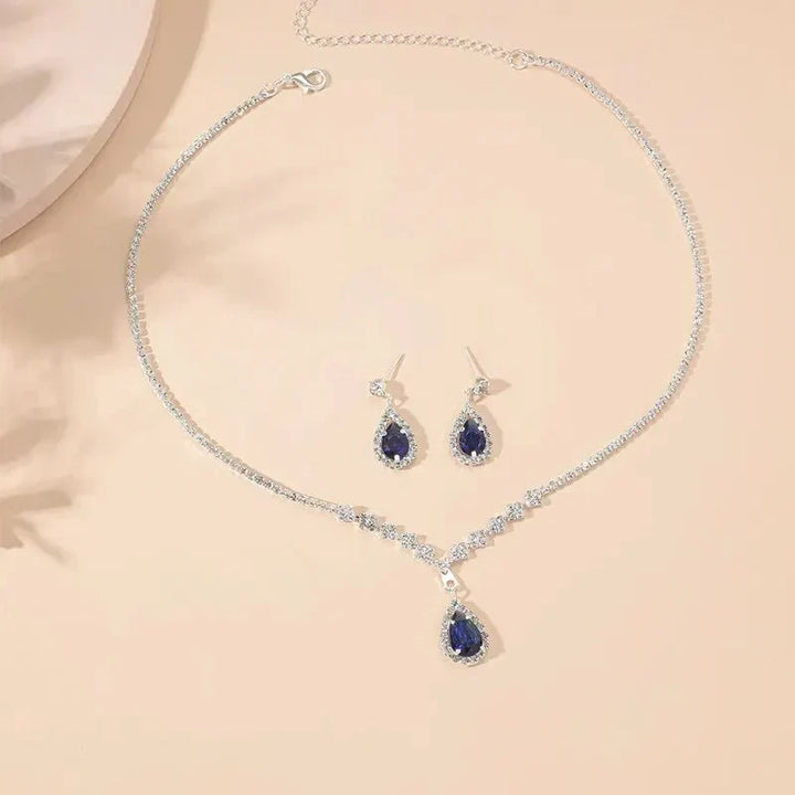 Karnz | Glittrande blå dropp-diamant-halsband och örhänge set